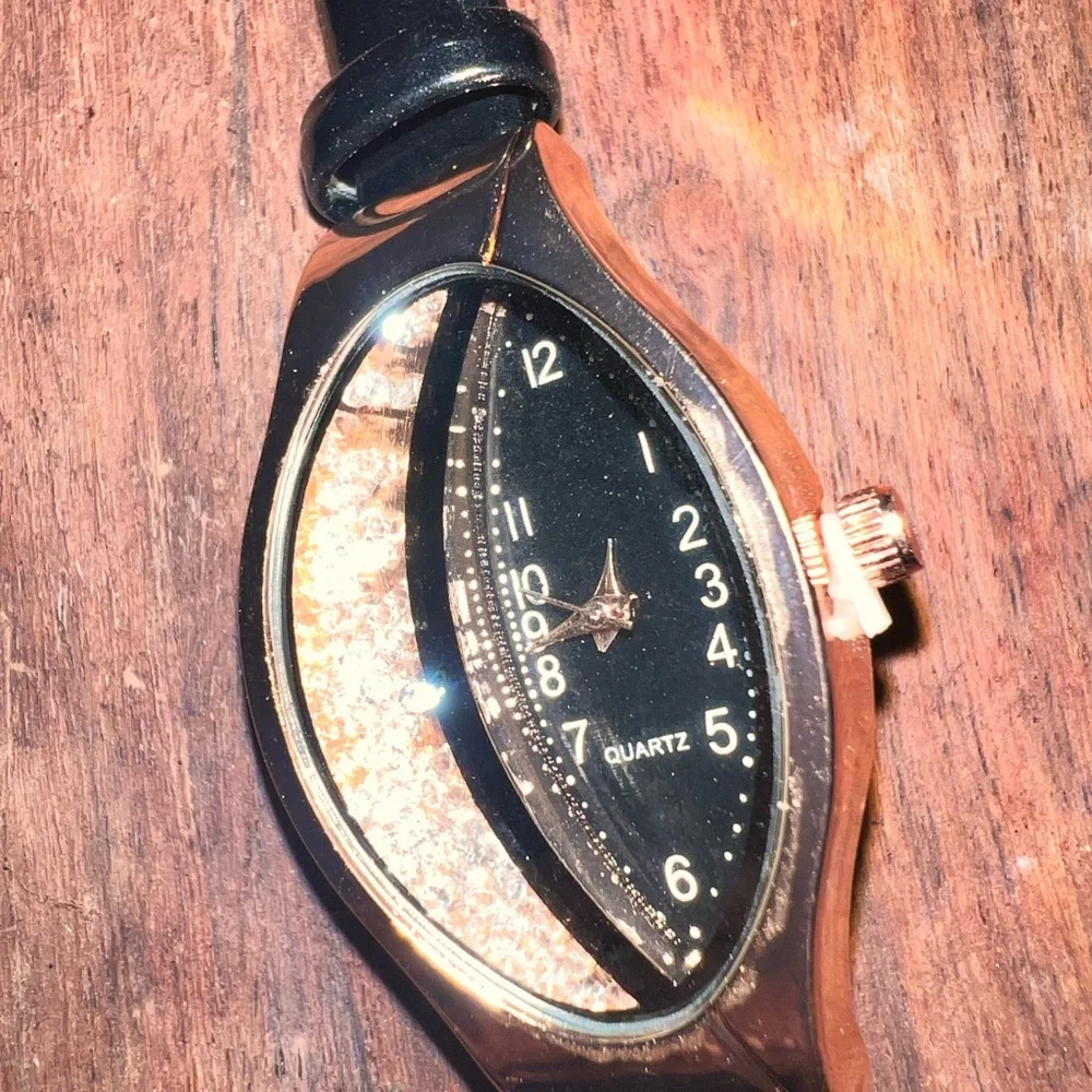 fashion watch with cz floating inside watch face ,‎ very beautiful